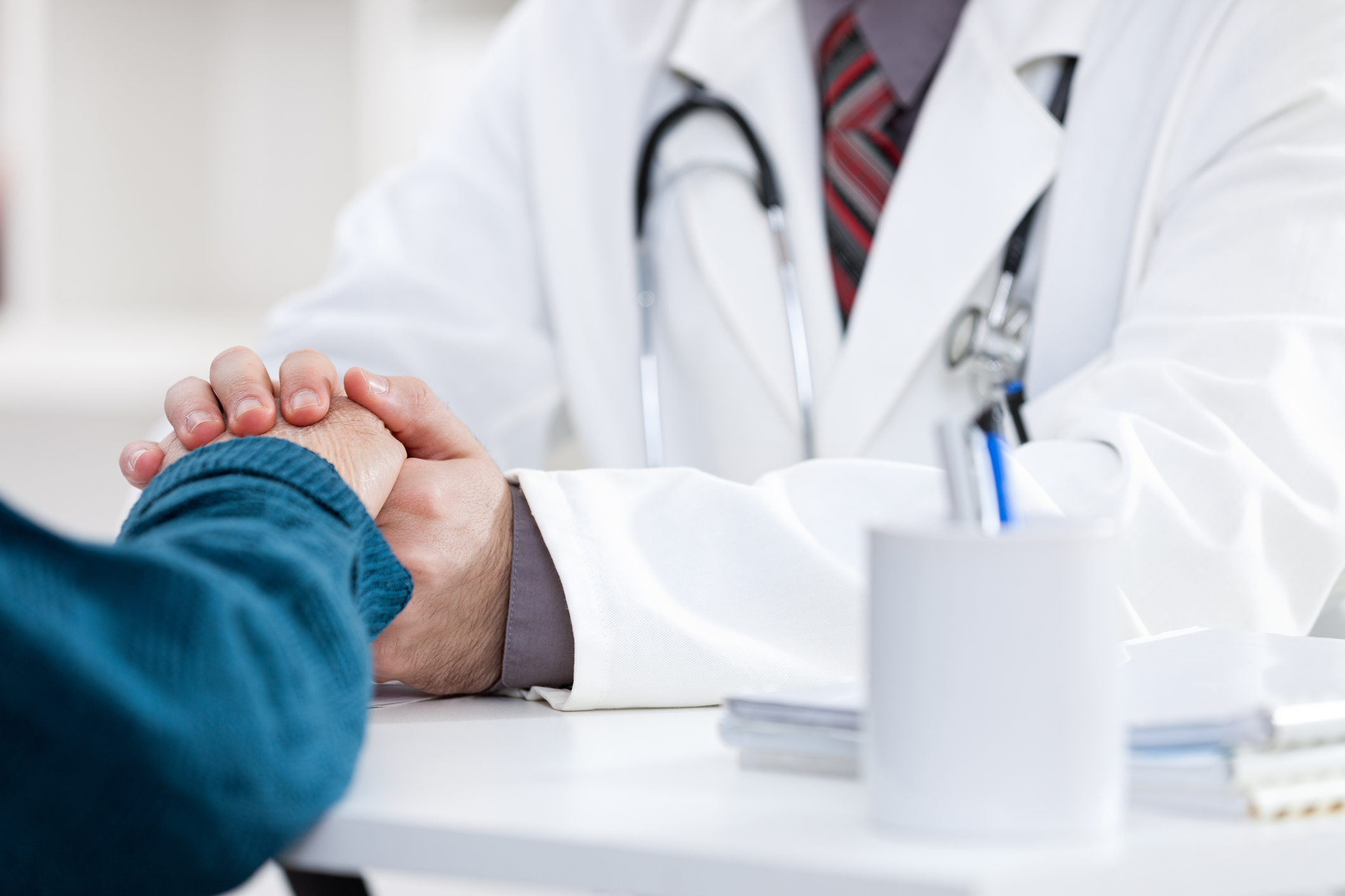 doctorcomfortingpatient.jpg