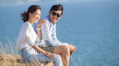 asian-man-and-woman-relaxing-vacation-at-sea-side.jpg