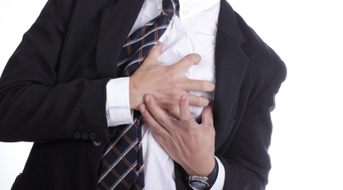 CGH - Activity Restrictions After A Heart Attack_Man grabs heart.jpg