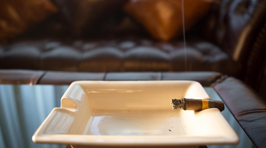 burning-cigar-in-ashtray.jpg