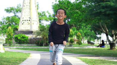 happy-asian-boy-in-the-park.jpg