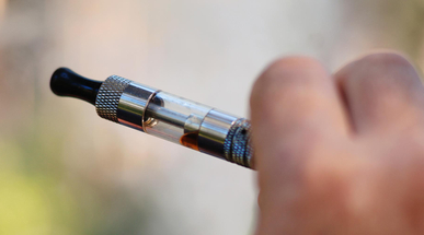 person-hand-holding-electronic-cigarette.jpg