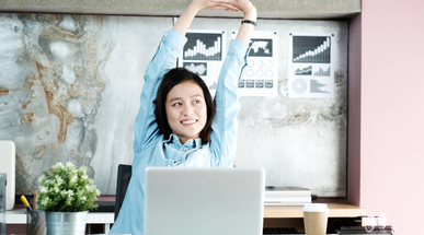 woman-streching-at-desk.jpg