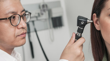 close-up-of-doctor-checking-patients-ears.jpg