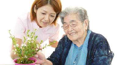Dementia_old lady with plant_shutterstock_149396273.jpg