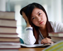 A woman suffering from the effects of stress planning to seek medical advice from a health professional.