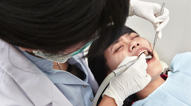 dentist_examining_patient.jpg