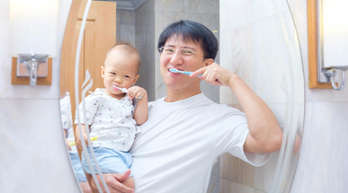 asian-father-teaching-kid-teeth-brushing.jpg
