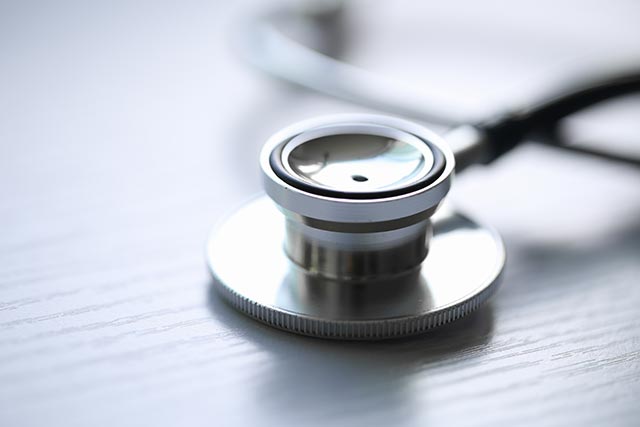Stethoscope on a wooden table