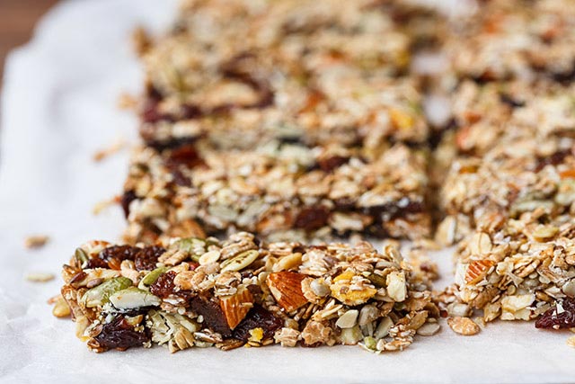 Practice healthy eating habits such as eating a healthy snack to curb hunger pangs.