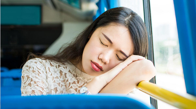 girl-taking-nap-on-a-public-bus.jpg