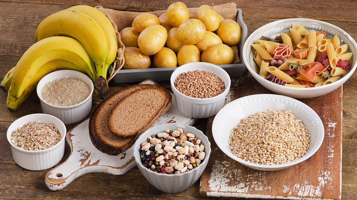 foods-high-in-carbohydrate-on-wooden-background.jpg
